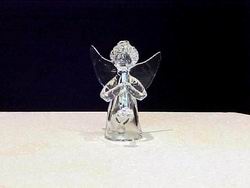 handblown glass Angel figurine with solid glass wings and is praying