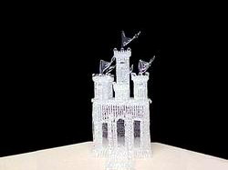 very large knitted glass Castle wedding cake top that comes in pieces.