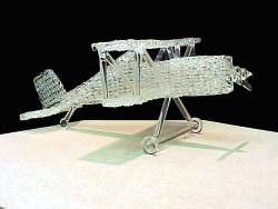 knitted glass single engine biplane with solid glass landing gear and propeller