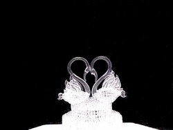 and blown glass swans wedding cake top